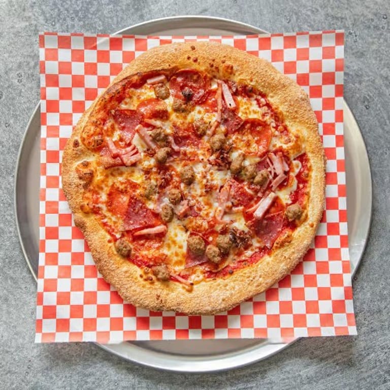 Indulge in Our Meat Lovers Pizza